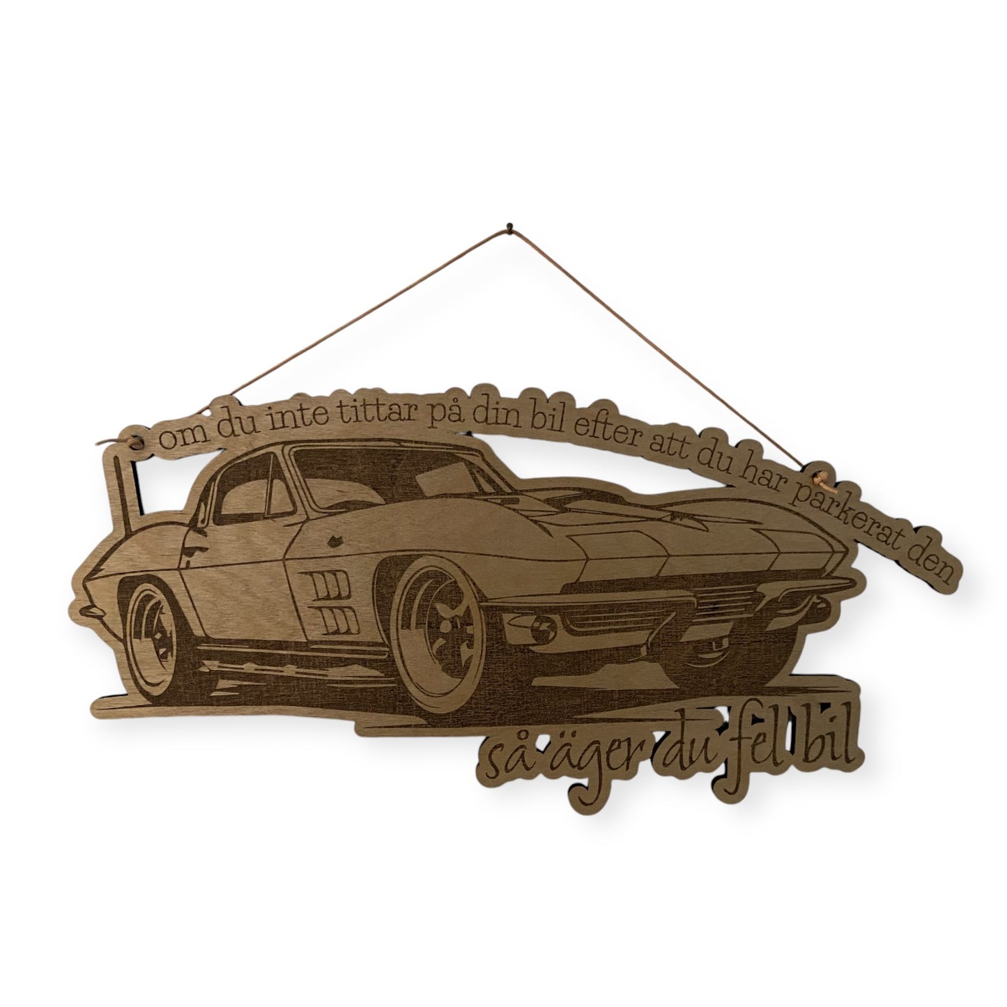 Skylt "om du inte tittar på din bil efter att du har parkerad den - så äger du fel bil"